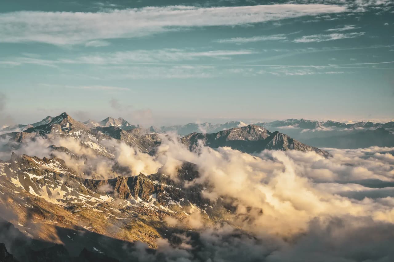 A panoramic view of the Mont Rose mountains, shrouded in cloud, inviting you to embark on an alpine adventure.
