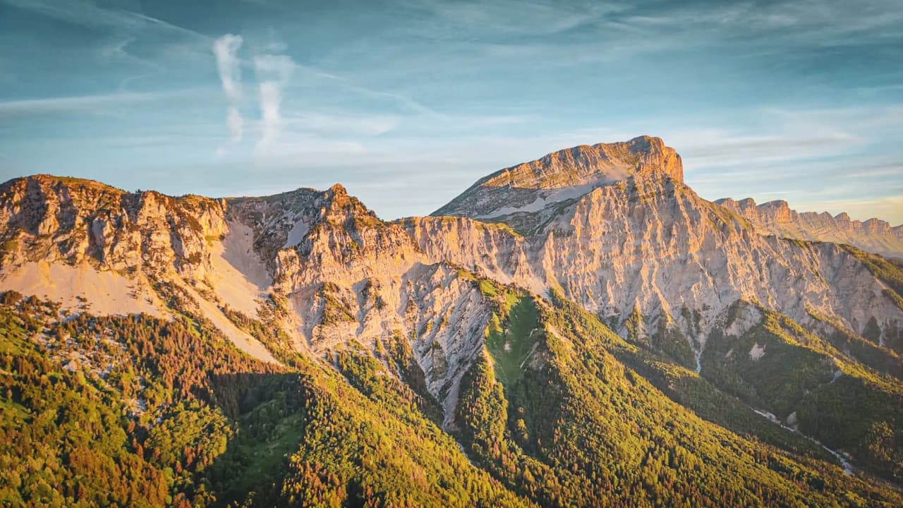 A magnificent view of Mont Aiguille, majestic and bathed in sunshine, beckoning you to set off on an adventure.
