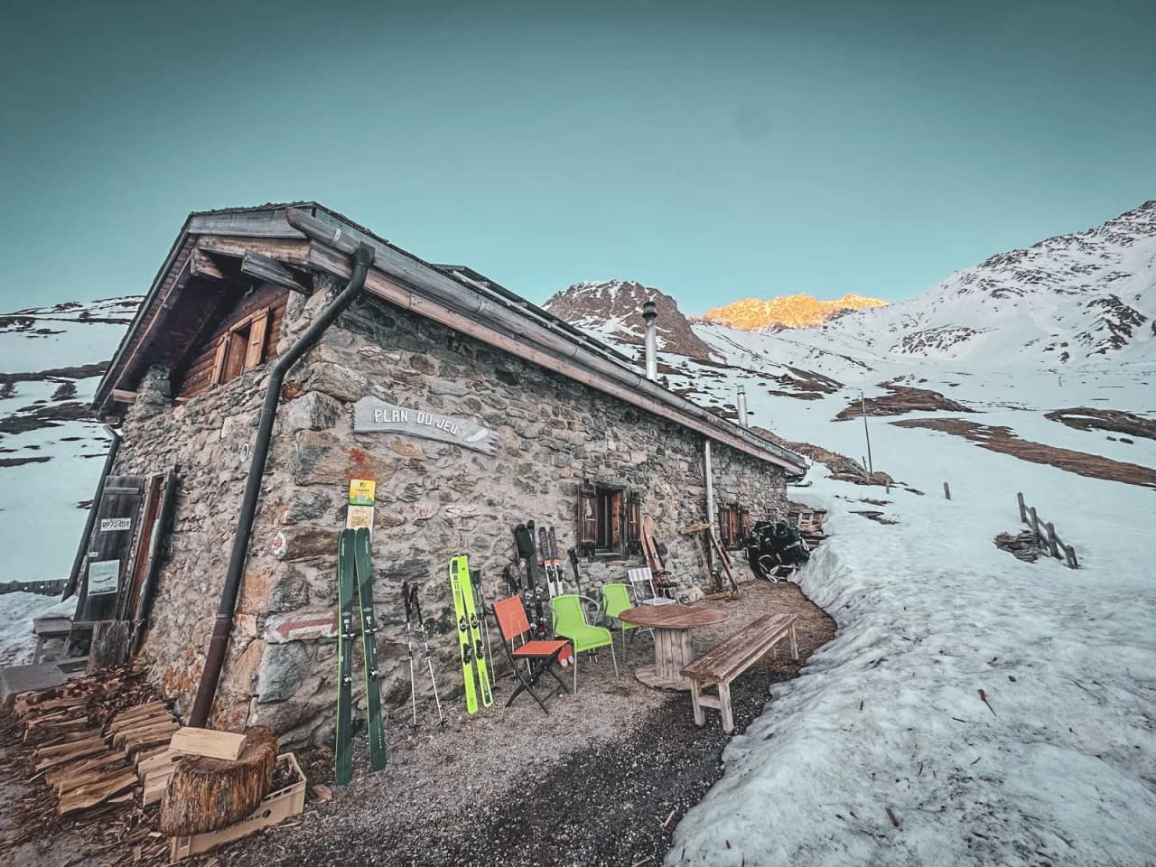 Stone Mountain hut on the Great Saint Bernard Pass, surrounded by snow and Alpine peaks. A skier's paradise!