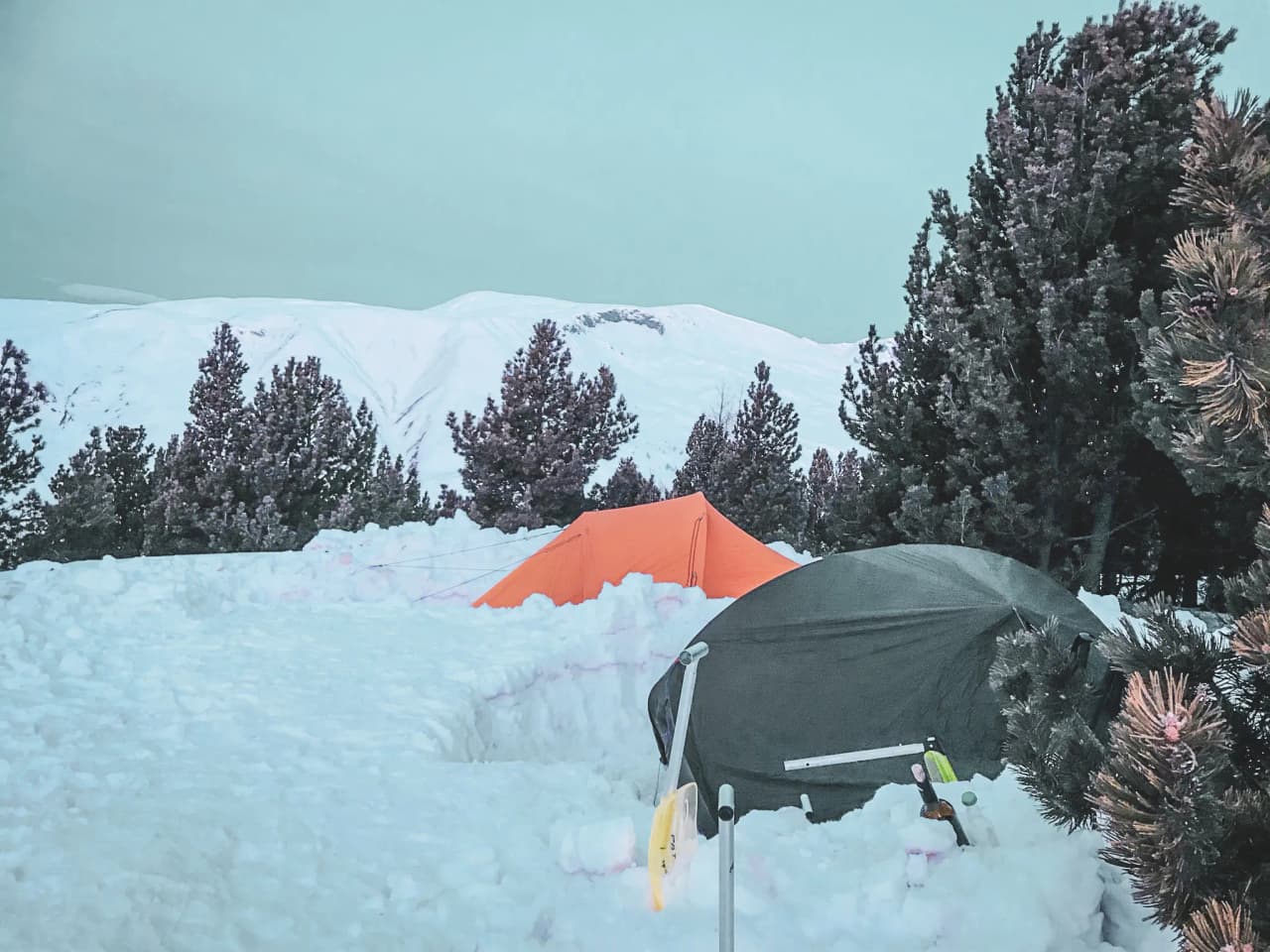 Two bivouacs set up in the middle of winter on the Meije glacier.