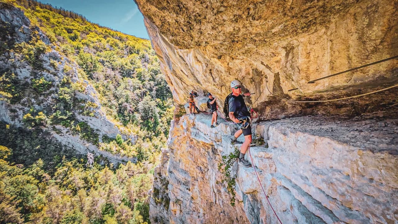 Climbing Mont Aiguille: adventurers on a spectacular ridge, breathtaking natural views.