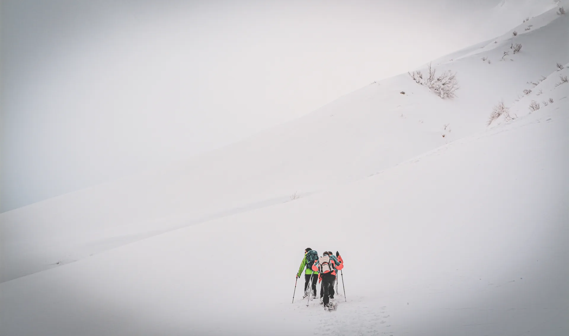 Hiker walking in the snow-covered Clarée valley