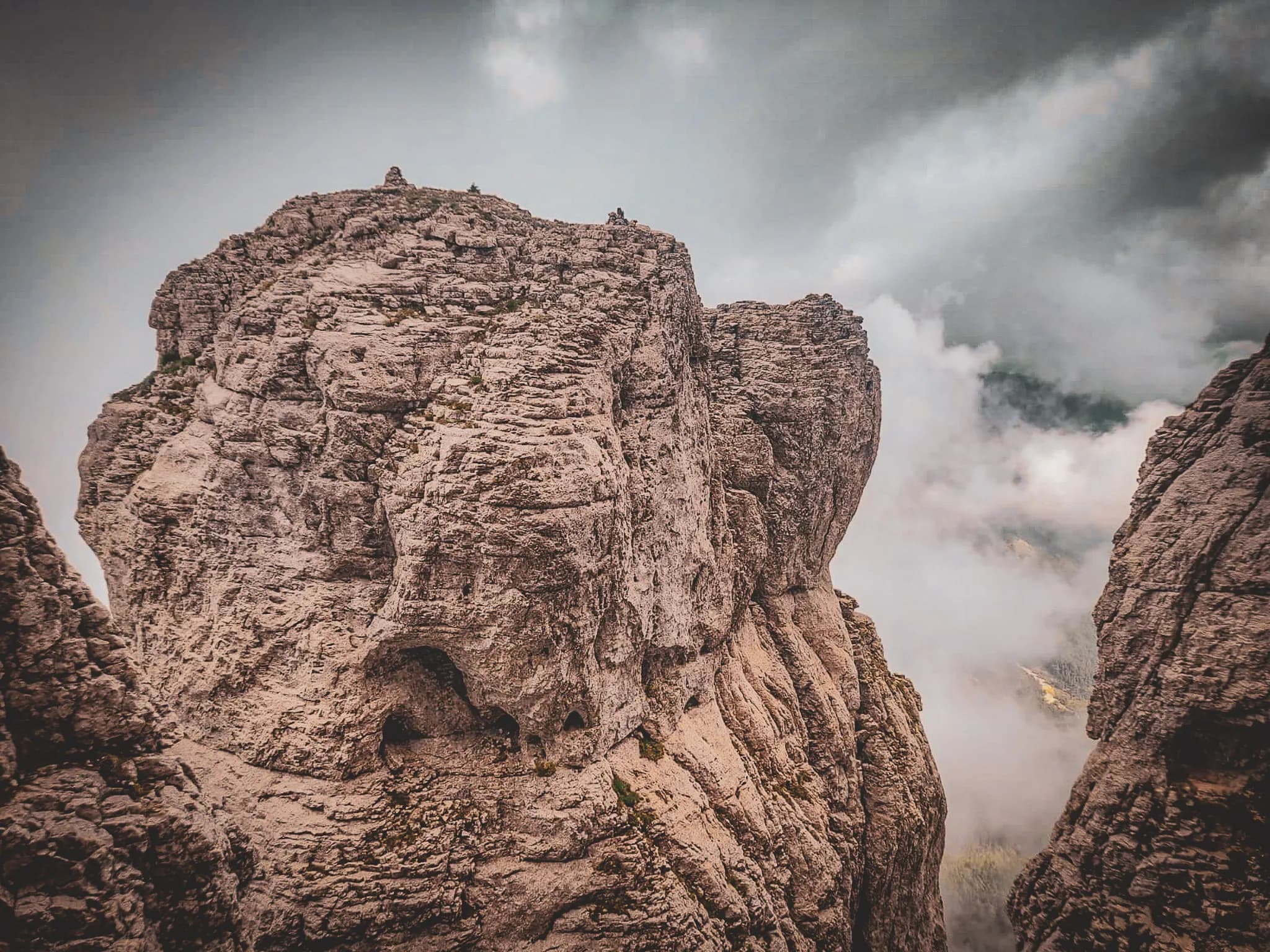 Spectacular view of Mont Aiguille, with its majestic cliffs rising out of the clouds.