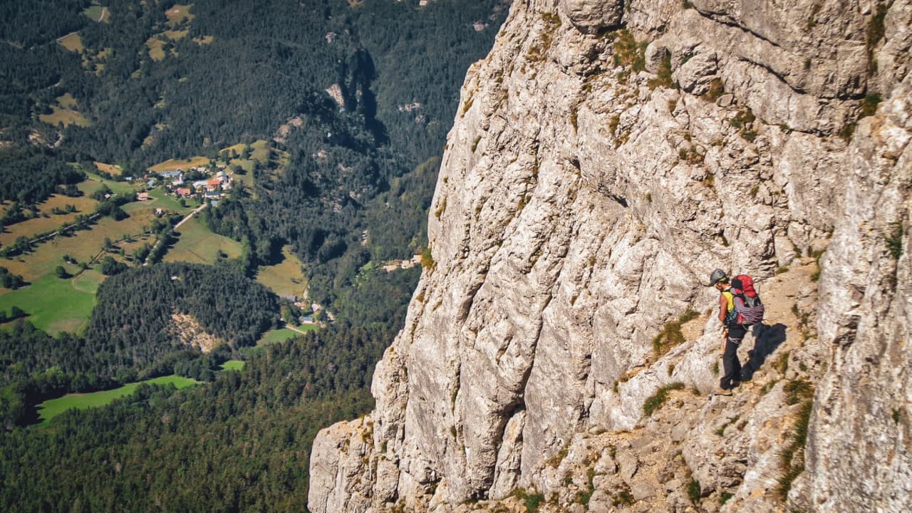 Climbing Mont Aiguille, with its majestic panorama over the green valley. An unforgettable adventure!
