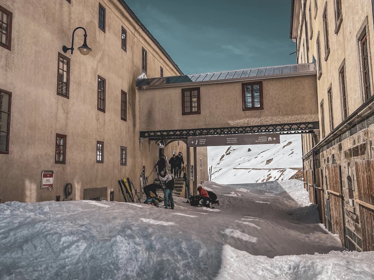 A group of skiers prepare to explore the immaculate snow of the Great Saint Bernard Pass.