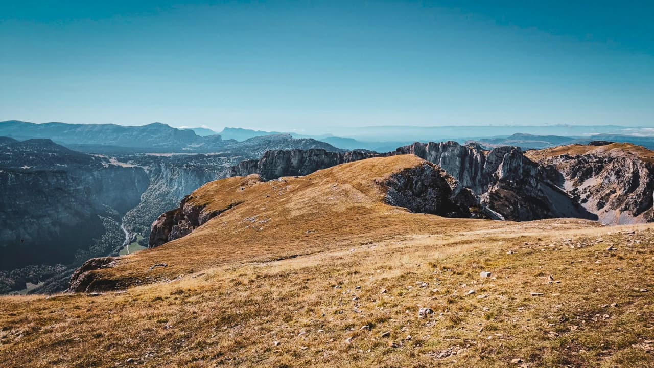 Panoramic view of Mont Aiguille, overlooking a spectacular, serene Alpine landscape.